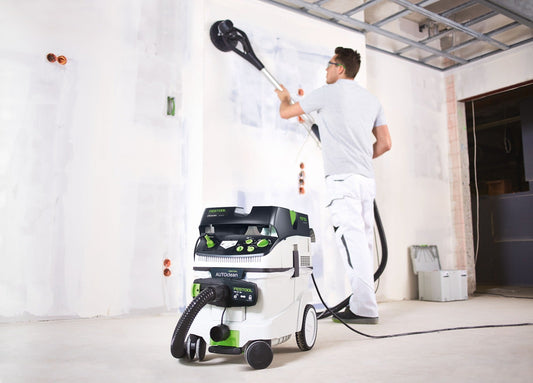 Festool Langhalsschleifer PLANEX easy LHS-E 225 bei Deckenarbeiten mit Absauganlage im Trockenbau.
